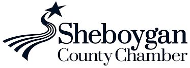 The image shows a logo with the words "Sheboygan County Chamber" accompanied by a stylized graphic with lines suggesting motion and a star above.
